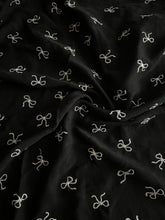 Load image into Gallery viewer, Embroidered CEY airflow woven: 2 YD CUT REMNANT Black white bows ⭐️
