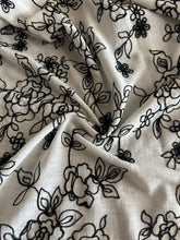 Load image into Gallery viewer, Embroidered linen blend: 4.75 YD CUT REMNANT White black embroidered floral ⭐️
