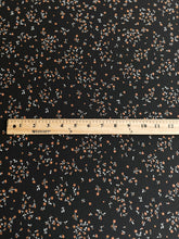 Load image into Gallery viewer, ITY Moss crepe: 4.25 YD CUT REMNANT Black tiny white orange flowers ⭐️
