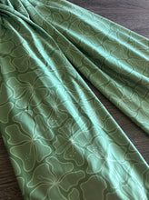 Load image into Gallery viewer, Double brushed poly: Green groovy Hawaiian floral ⭐️
