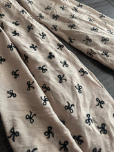 Load image into Gallery viewer, Embroidered CEY airflow woven: 2.5 YD CUT REMNANT Warm taupe black bows ⭐️
