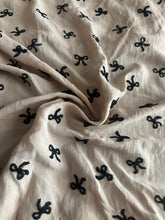 Load image into Gallery viewer, Embroidered CEY airflow woven: 2.5 YD CUT REMNANT Warm taupe black bows ⭐️

