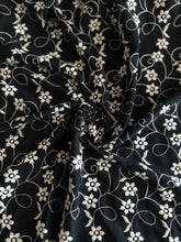 Load image into Gallery viewer, Rayon crinkle embroidered woven: 3.75 YD CUT REMNANT Black embroidered floral ⭐️
