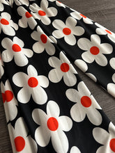 Load image into Gallery viewer, Double brushed poly: Black white orange flowers ⭐️
