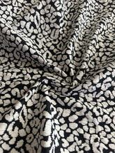 Load image into Gallery viewer, Jacquard stretchy knit (double knit like): 3 YD CUT REMNANT Black white leopard print ⭐️
