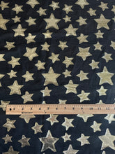 Load image into Gallery viewer, Woven lurex: 4.25 YD CUT REMNANT Black gold lurex stars ⭐️
