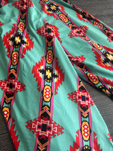 Load image into Gallery viewer, Double brushed poly: 3 YD CUT REMNANT Dark mint with red orange Aztec print ⭐️
