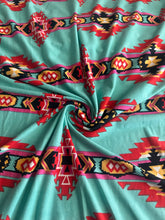 Load image into Gallery viewer, Double brushed poly: 3 YD CUT REMNANT Dark mint with red orange Aztec print ⭐️
