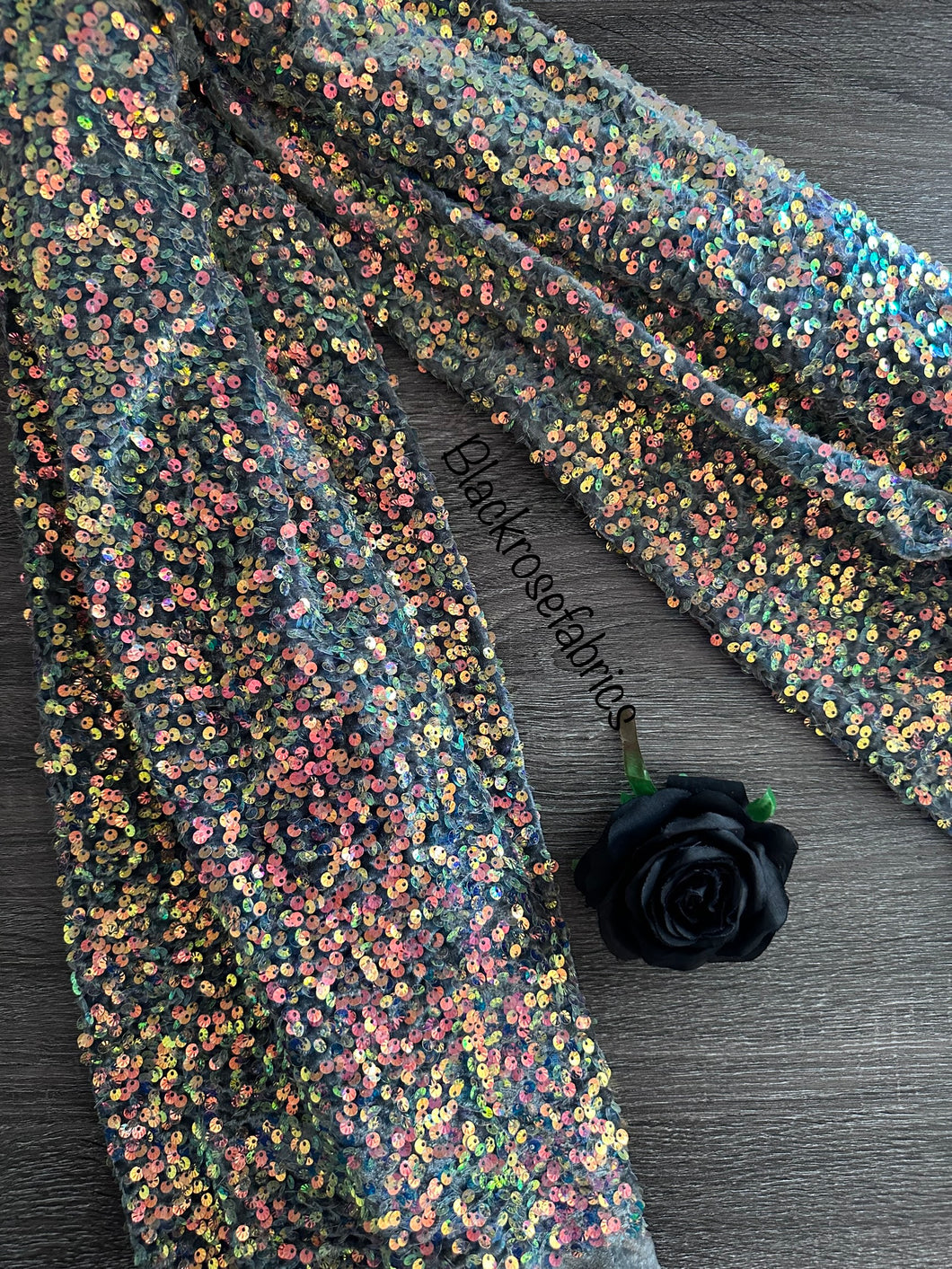 Stretch velvet with multi color shell sequins